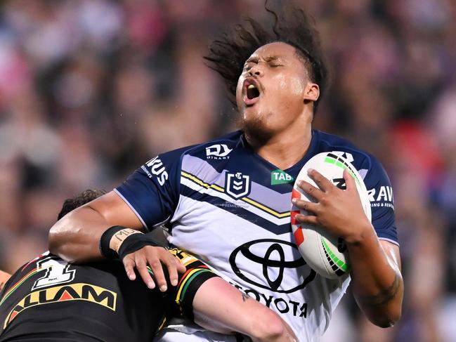 Luciano Leilua of the Cowboys is tackled by Dylan Edwards of the Panthers during the round 27 NRL match between Penrith Panthers and North Queensland Cowboys at BlueBet Stadium on September 02, 2023 in Penrith, Australia. (Photo by Izhar Khan/Getty Images)