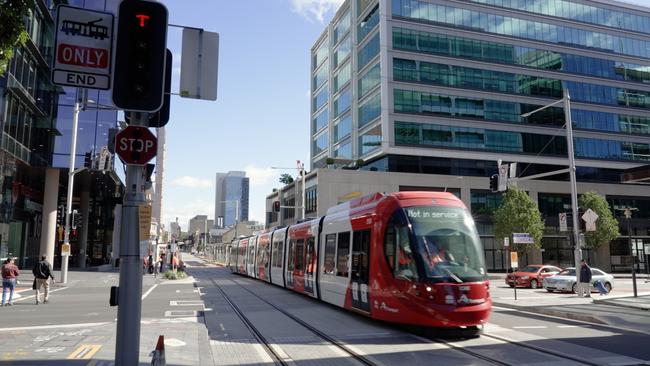 The light rail glides along Macquarie St.