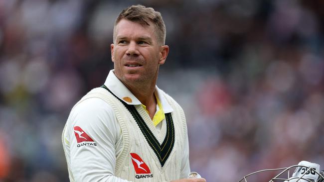 Australia's David Warner received support from Vaughan. (Photo by Adrian DENNIS / AFP)