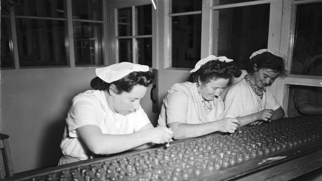 Workers at the Cadbury factory at Claremont Tasmania in December 1948. Making Cadbury Milk Tray assortments. Picture: Mercury historical archive