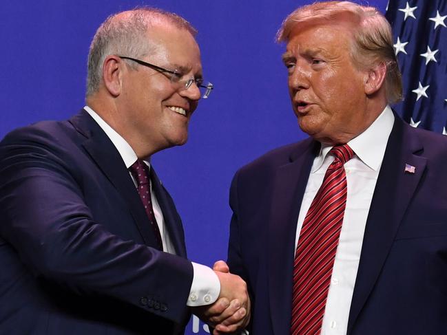 (FUS President Donald Trump and Australian Prime Minister Scott Morrison shake hands during a visit to Pratt Industries plant opening in Wapakoneta, Ohio. Picture: AFP