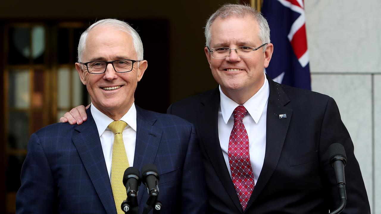 Scott Morrison’s beaming face, proudly supporting former PM Malcolm Turnbull before he was ousted, has been at the forefront of Labor campaigns. Picture: Kym Smith