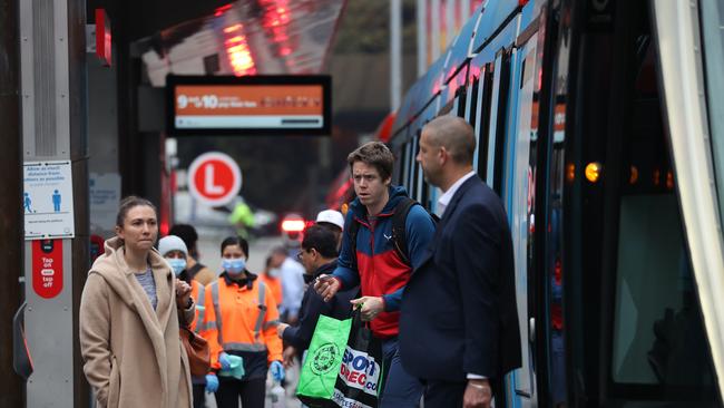 Commuters take the light rail at Circular Quay in the Sydney CBD. Picture: NCA NewsWire /Dylan Coker