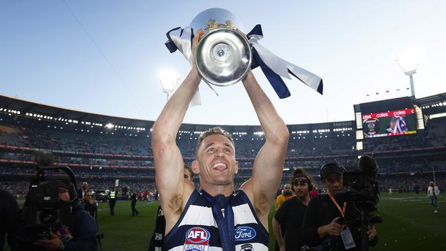 MELBOURNE, AUSTRALIA - SEPTEMBER 24: Joel Selwood of the Cats holds aloft the premiership cup after winning the 2022 AFL Grand Final match between the Geelong Cats and the Sydney Swans at the Melbourne Cricket Ground on September 24, 2022 in Melbourne, Australia. (Photo by Daniel Pockett/AFL Photos/via Getty Images)