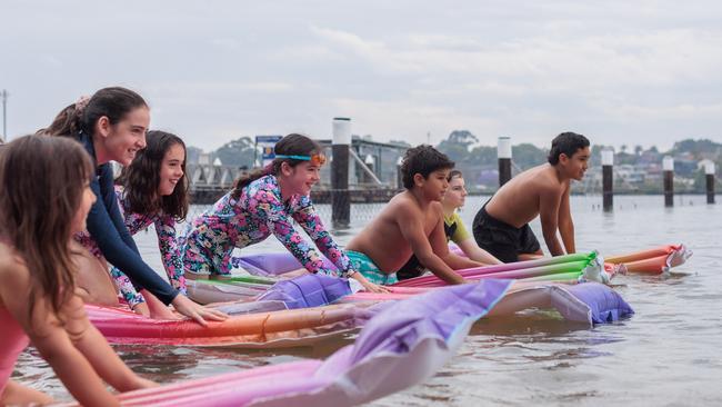 A lilo race kicks off the opening of the Bayview Park swim spot on November 13. Picture: Ben Williams