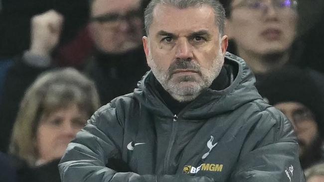 Tottenham Hotspur's Greek-Australian Head Coach Ange Postecoglou looks on during the English FA Cup fourth round football match between Aston Villa and Tottenham Hotspur at Villa Park in Birmingham, central England on February 9, 2025. (Photo by JUSTIN TALLIS / AFP) / RESTRICTED TO EDITORIAL USE. No use with unauthorized audio, video, data, fixture lists, club/league logos or 'live' services. Online in-match use limited to 120 images. An additional 40 images may be used in extra time. No video emulation. Social media in-match use limited to 120 images. An additional 40 images may be used in extra time. No use in betting publications, games or single club/league/player publications. /