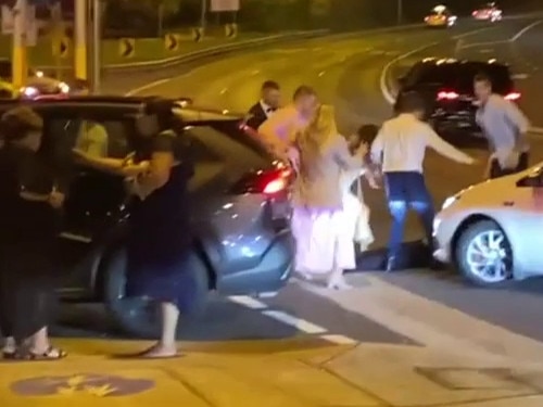 The wedding party brawl in the middle of Spit Rd at Mosman.