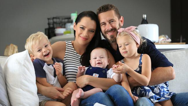 Suz and Phil Cox with their children, Porter 3, Levi, 4 months and Aria, 4, Picture: Jamie Hanson