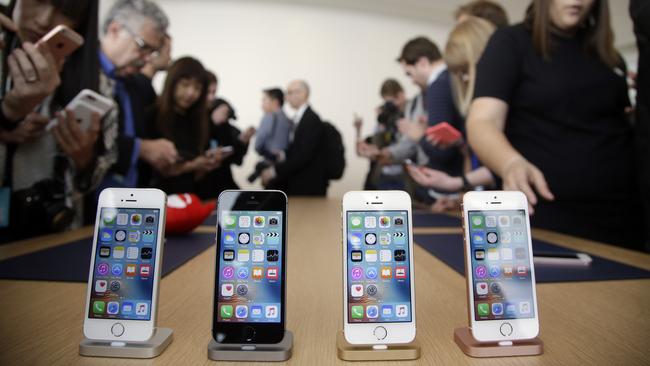The different coloured models of the new iPhone SE in all their glory. Picture: AP/Marcio Jose Sanchez
