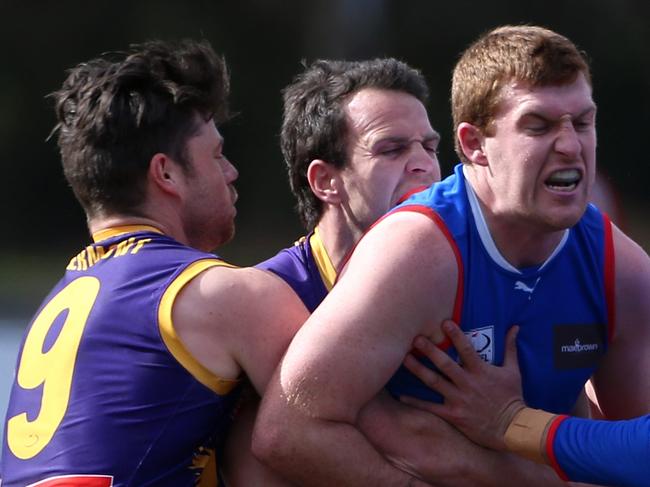 Joshua Allison of South Croydon is tackled by Lachlan Johns (L) of Vermont during EFL (Div 1): Vermont v South Croydon at Bayswater Oval on Saturday, September 9, 2017, in Bayswater, Victoria, Australia.Picture: Hamish Blair