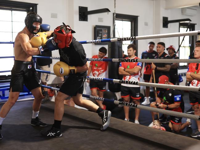 The Dragons watch Sam Goodman (L) as he prepares for his December 15 headline fight at the Star Casino. Picture: Mark Evans / No Limit Boxing