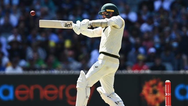 Nathan Lyon bats during day two of the Third Test match at MCG.