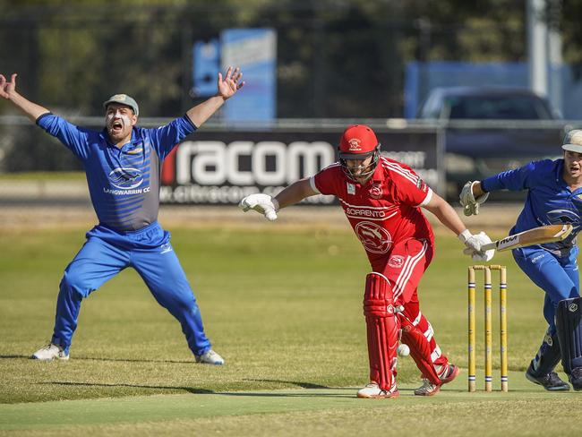 Langwarrin’s Taylor Smith asks the question as Sorrento batsman Bobby Wilson looks unperturbed. Picture: Valeriu Campan