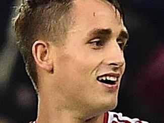 Manchester United's Belgian midfielder Adnan Januzaj (L) celebrates with Manchester United's English defender Luke Shaw after he scored his team's first goal during the English Premier League football match between Aston Villa and Manchester United at Villa Park in Birmingham, central England, on August 14, 2015. AFP PHOTO / BEN STANSALL RESTRICTED TO EDITORIAL USE. No use with unauthorized audio, video, data, fixture lists, club/league logos or 'live' services. Online in-match use limited to 75 images, no video emulation. No use in betting, games or single club/league/player publications.