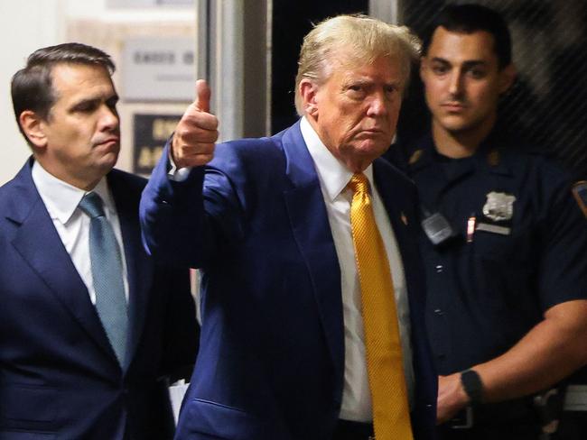 Donald Trump walks into the court following a break during his trial for allegedly covering up hush money payments linked to extramarital affairs, at Manhattan Criminal Court in New York City. Picture: AFP