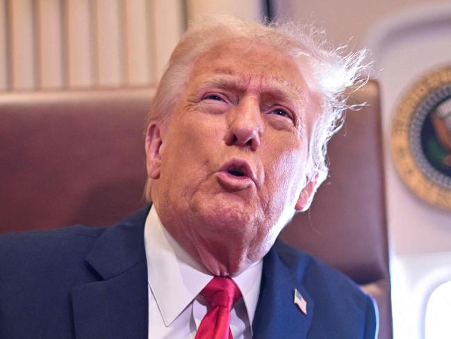 US President Donald Trump speaks to the press after signing a proclamation renaming the Gulf of Mexico as the Gulf of America aboard Air Force One, as it flies over the Gulf enroute to New Orleans, Louisiana on Febrary 09, 2025. For years, as disputes over names on the map riled up nationalist passions in several parts of the world, US policymakers have watched warily, trying to stay out or to quietly encourage peace. Suddenly, the United States has gone from a reluctant arbiter to a nomenclature belligerent, as President Donald Trump declared that the Gulf of Mexico will henceforth be called the "Gulf of America." In an executive order signed hours after he returned to the White House, Trump called the water body an "indelible part of America" critical to US oil production and fishing and "a favorite destination for American tourism and recreation activities." (Photo by ROBERTO SCHMIDT / AFP)