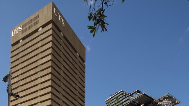 EK1D0H One Central Park, Sydney Australia. Architect by Jean Nouvel in front of the UTS Tower, "Sydney's ugliest building."