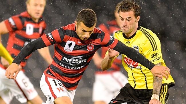 Jaushua Sotirio is controls the ball for the Wanderers.