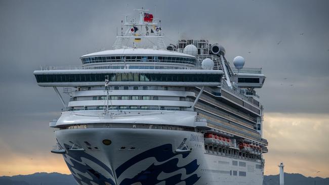 Greg and Lynne Dunn are currently on-board the cruise ship docked in the Japanese port of Yokohama along with nearly 4000 other passengers who have been put into mandatory quarantine for two weeks. Image: Carl Court/Getty Images