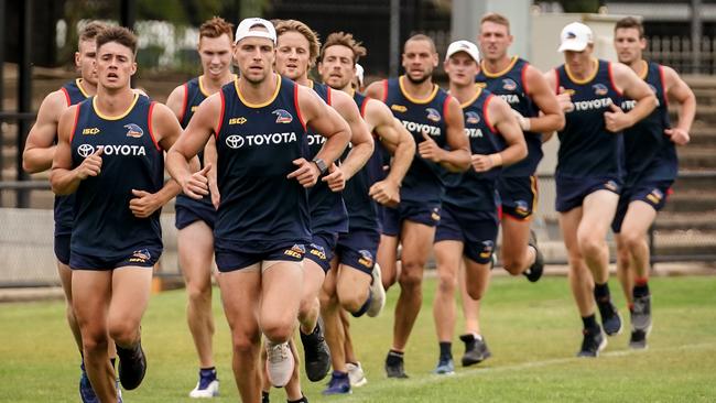 Crows players compete the time trial at Thebarton Oval. Picture: MIKE BURTON