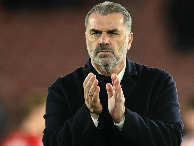 Tottenham Hotspur's Greek-Australian Head Coach Ange Postecoglou applauds the fans following the English Premier League football match between Southampton and Tottenham Hotspur at St Mary's Stadium in Southampton, southern England on December 15, 2024. (Photo by JUSTIN TALLIS / AFP) / RESTRICTED TO EDITORIAL USE. No use with unauthorized audio, video, data, fixture lists, club/league logos or 'live' services. Online in-match use limited to 120 images. An additional 40 images may be used in extra time. No video emulation. Social media in-match use limited to 120 images. An additional 40 images may be used in extra time. No use in betting publications, games or single club/league/player publications. /