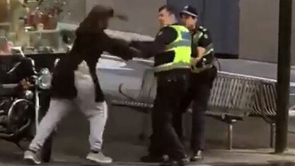 Hassan Khalif Shire Ali attacks police on Bourke St.