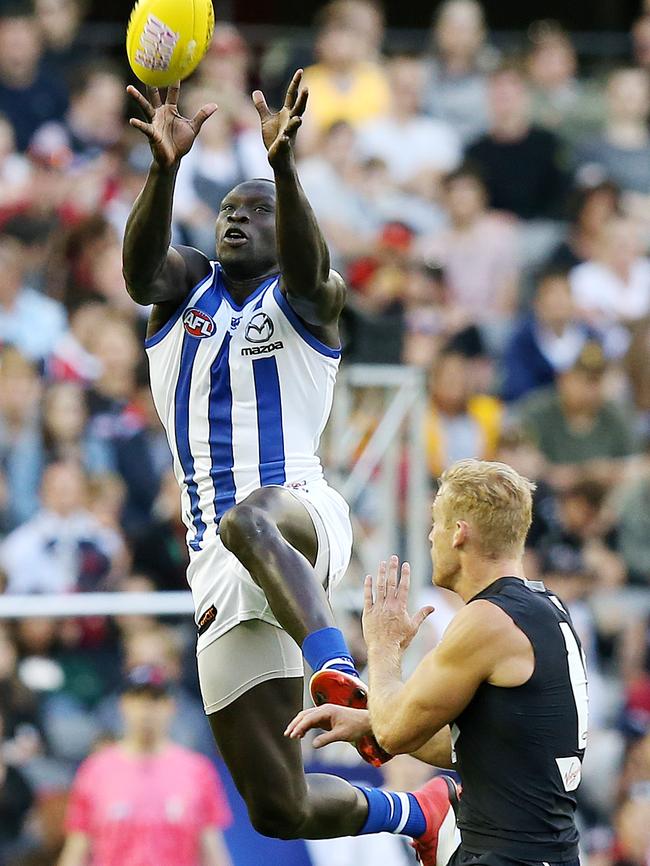 Majak Daw hit this marking attempt at speed to intercept. Picture: Michael Klein