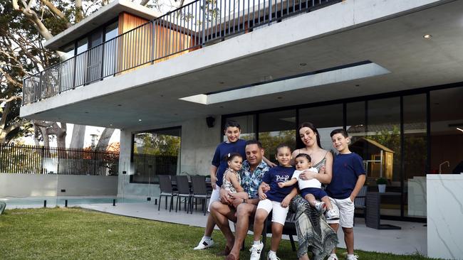Sellers Tim and Natalie, with their five children, were surprised how much their home value increased. Picture: Sam Ruttyn