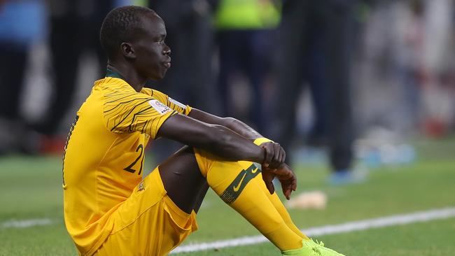 Awer Mabil of Australia reacts to Australia’s exit.