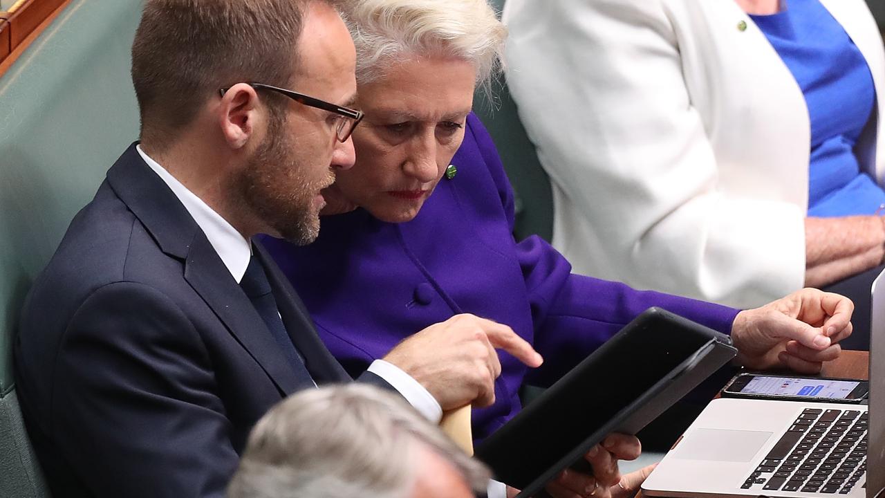Greens MP Adam Bandt talking with Dr Kerryn Phelps during Question Time. Picture: Kym Smith
