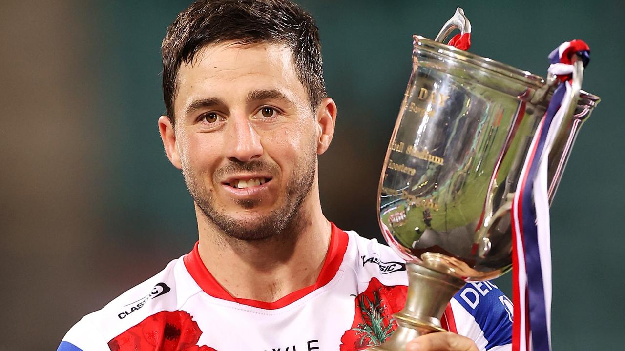 Ben Hunt of the Dragons celebrates victory with the ANZAC Day trophy. Photo by Mark Kolbe/Getty Images.