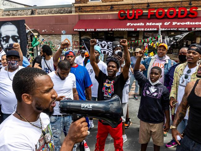 Tommy McBrayer, a community organiser, calls to people at George Floyd Memorial Square in Minneapolis, Minnesota. Picture: AFP