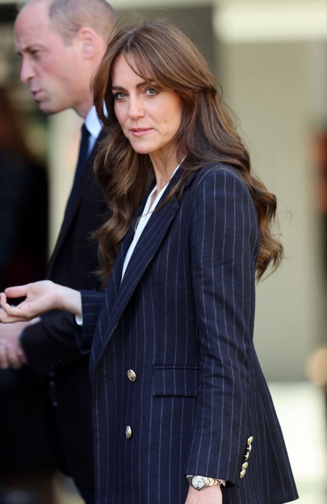 October 3: Kate Middleton wore a navy pinstripe blazer with gold buttons for an appearance in Cardiff, Wales. Picture: Chris Jackson/Getty Images