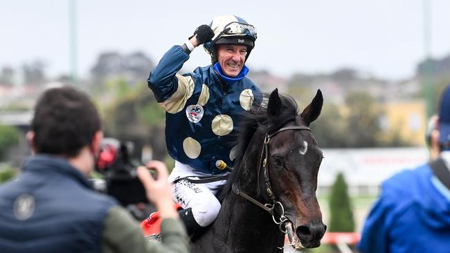 The jubilant jockey returns to the mounting yard. Picture: Getty Images