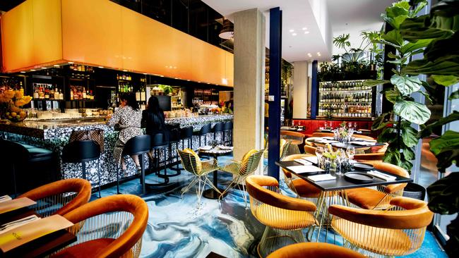 Cool and colourful: The bar and dining room. Picture: Nicole Cleary