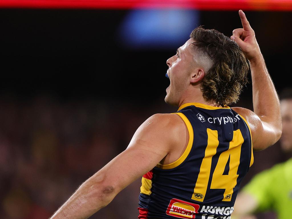 Soligo celebrates a goal against Essendon. Picture: Sarah Reed/AFL Photos via Getty Images)