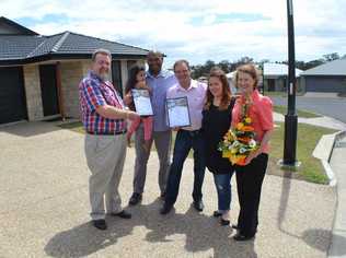 ALL SMILES: At the award ceremony are (from left) Councillor Paul Tully, Addison and Nirvan Soogrim with Mayor Paul Pisasale, Shae Freeth and Councillor Sheila Ireland. Picture: PETER CHAPMAN