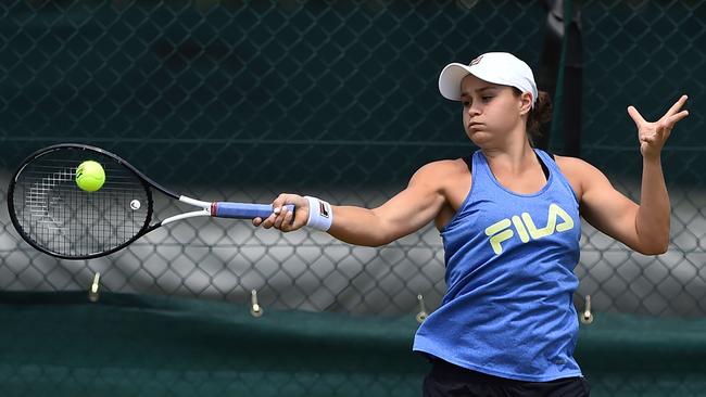 Australia's Ashleigh Barty hits a forehand at the practice courts at The All England Tennis Club in Wimbledon. Picture: AFP