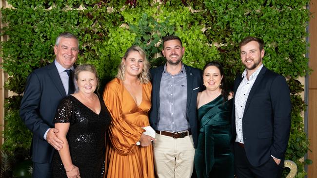 Queensland avocado growers Lachlan and Annaleise Donovan with son Miles and his wife, Emma, and son Clay and his wife, Ashley, receiving their grower of the year award at Hort Connections. Picture: Supplied