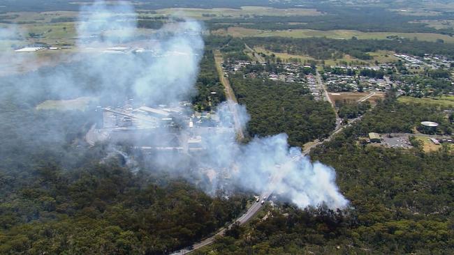 Smoke seen billowing from what is believed to be the bushland site of a plane crash in Appin, southwest of Sydney. Picture: 9 News
