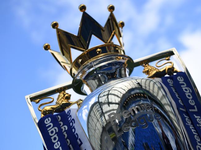 (FILES) In this file photo taken on August 12, 2017 The Premier league trophy is pictured beneath the blue sky ahead of the English Premier League football match between Brighton and Hove Albion and Manchester City at the American Express Community Stadium in Brighton, southern England. - Brentford and Fulham will slug it out for a place in the Premier League on Tuesday, August 4 when the London rivals clash in a Championship play-off final worth an estimated Â£170 million ($220 million) to the winners. (Photo by CHRIS J RATCLIFFE / AFP) / RESTRICTED TO EDITORIAL USE. No use with unauthorized audio, video, data, fixture lists, club/league logos or 'live' services. Online in-match use limited to 120 images. An additional 40 images may be used in extra time. No video emulation. Social media in-match use limited to 120 images. An additional 40 images may be used in extra time. No use in betting publications, games or single club/league/player publications. /