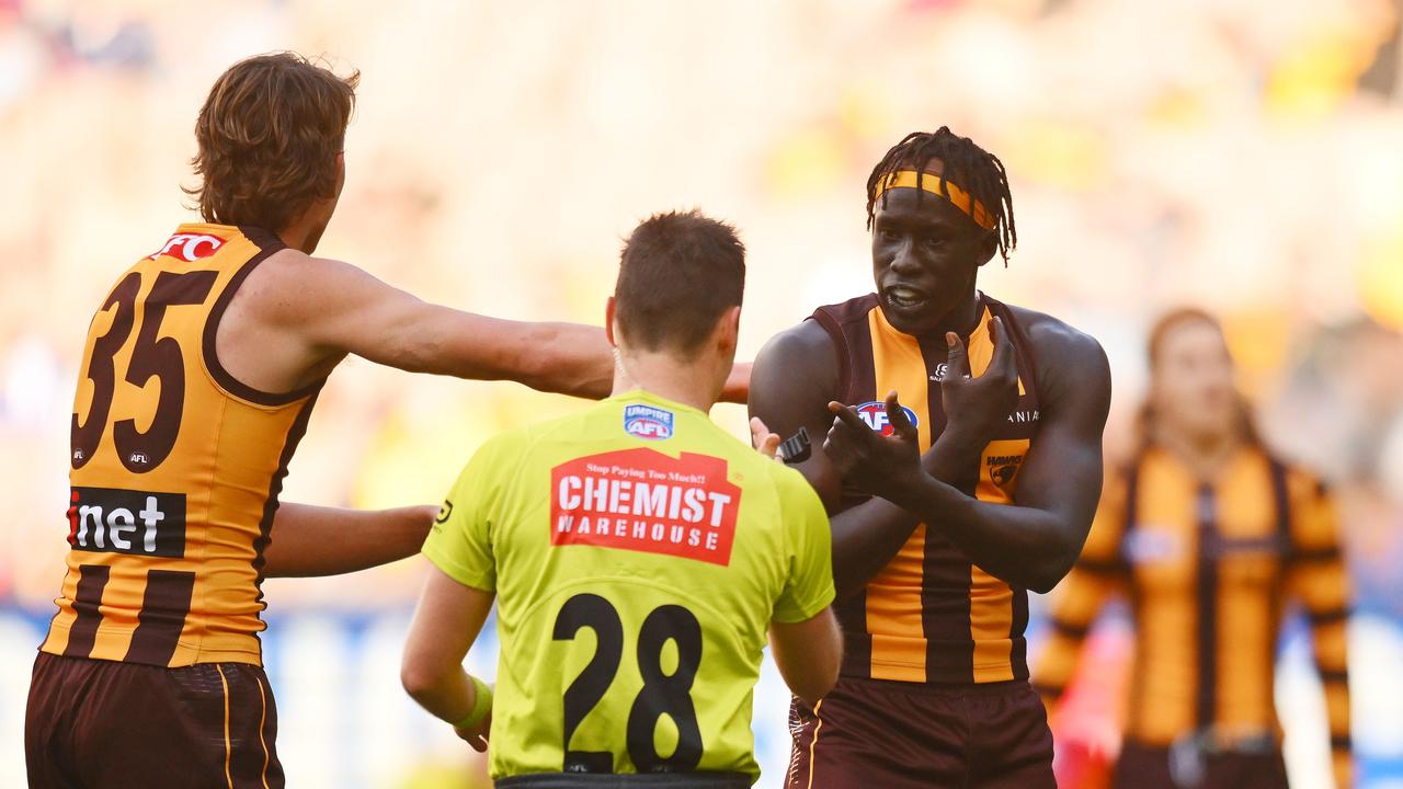 Jiath argues with the umpire after being reported. (Photo by Morgan Hancock/AFL Photos/via Getty Images)