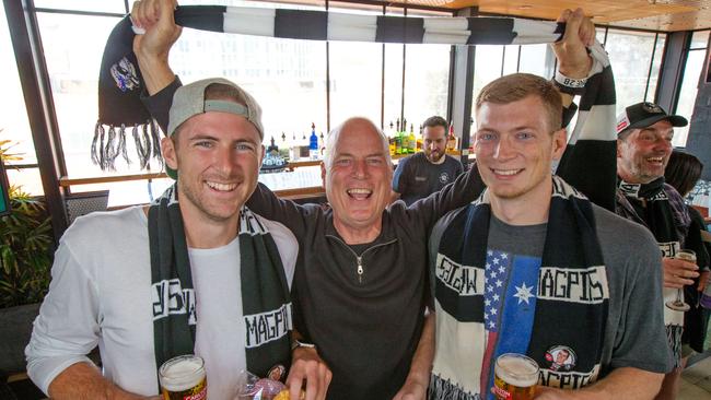 Mason’s father Phil with older brother Nolan and younger brother Austin. Picture: Mark Stewart