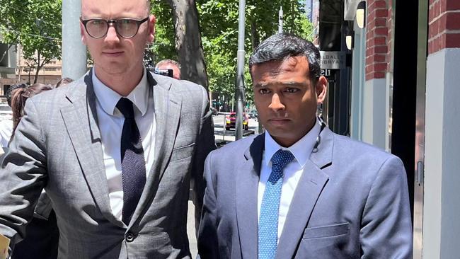 Former PwC associate, David Maria Anthony Rayan, 33 (right) with his lawyer Kieran Burke after a previous appearance in Melbourne Magistrates’ Court. Picture Laura Placella