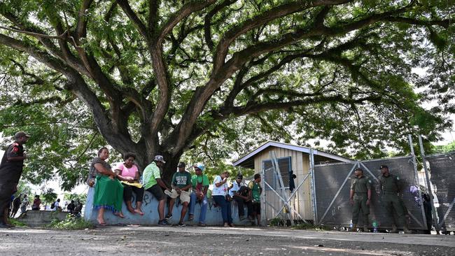 Members of the Solomons International Assistance Force stand guard outside a counting centre in Honiara on Thursday. Picture: AFP