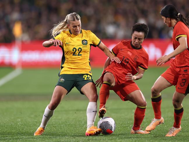Matildas’ Charlotte Grant and Chinese goalscorer Zhang Linyan compete for the ball. Picture: Getty Images
