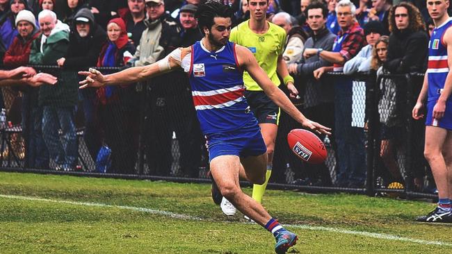 Brayden Kilpatrick gets a kick away for South Croydon. Picture: Cassidy Captured