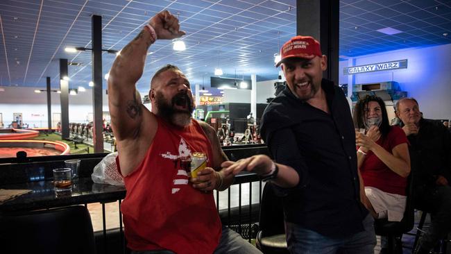 People cheer as Florida is called for US President Donald Trump at a watch party for Republicans on election day. Picture: AFP