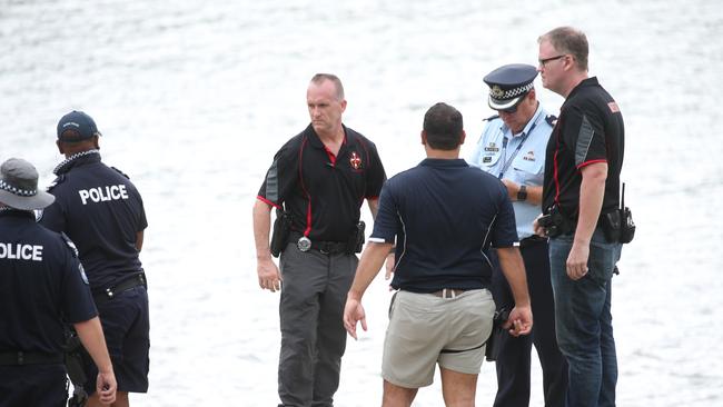 Police on the southern shore of the Barron River involved in the hunt for an armed man who has evaded arrest since early this morning. PICTURE: STEWART McLEAN