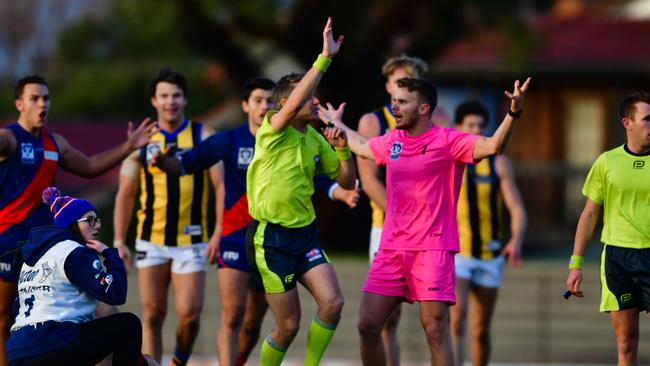 The moment an umpire awarded a 50m penalty which cost Coburg victory against Sandringham. Picture: Dave Savell.